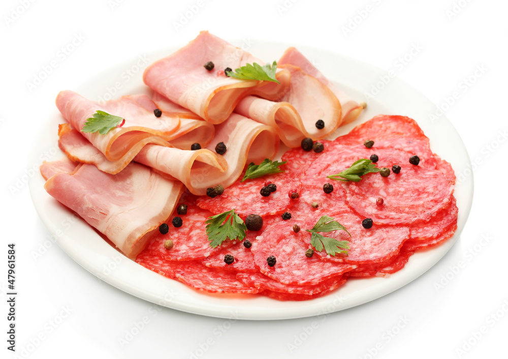 tasty bacon and sausage with spices on plate, isolated on white