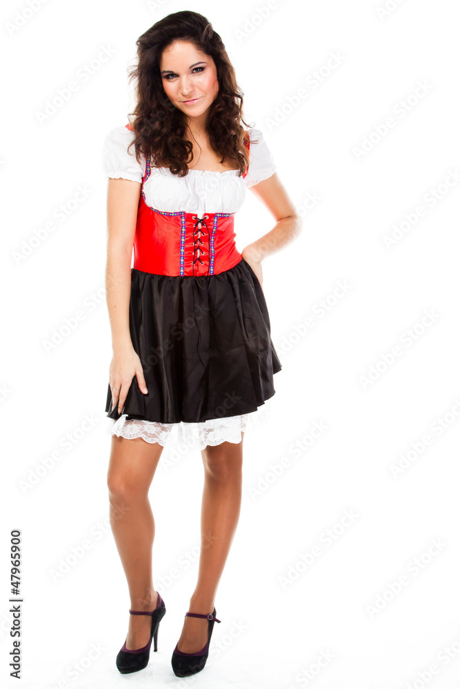 young and beautiful woman in a traditional Bavarian dress young and beautiful woman in a traditional Bavarian dress