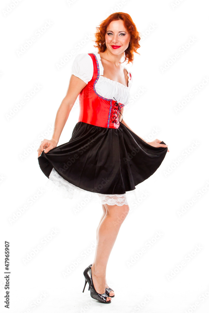 young and beautiful woman in a traditional Bavarian dress young and beautiful woman in a traditional Bavarian dress