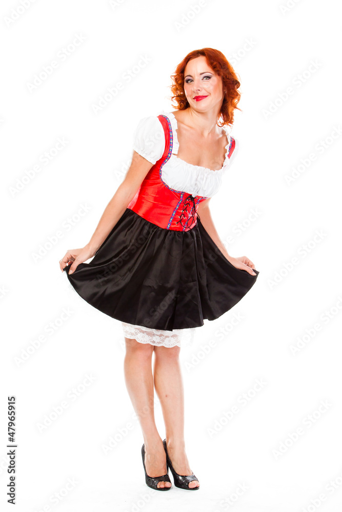 Naklejka premium young and beautiful woman in a traditional Bavarian dress