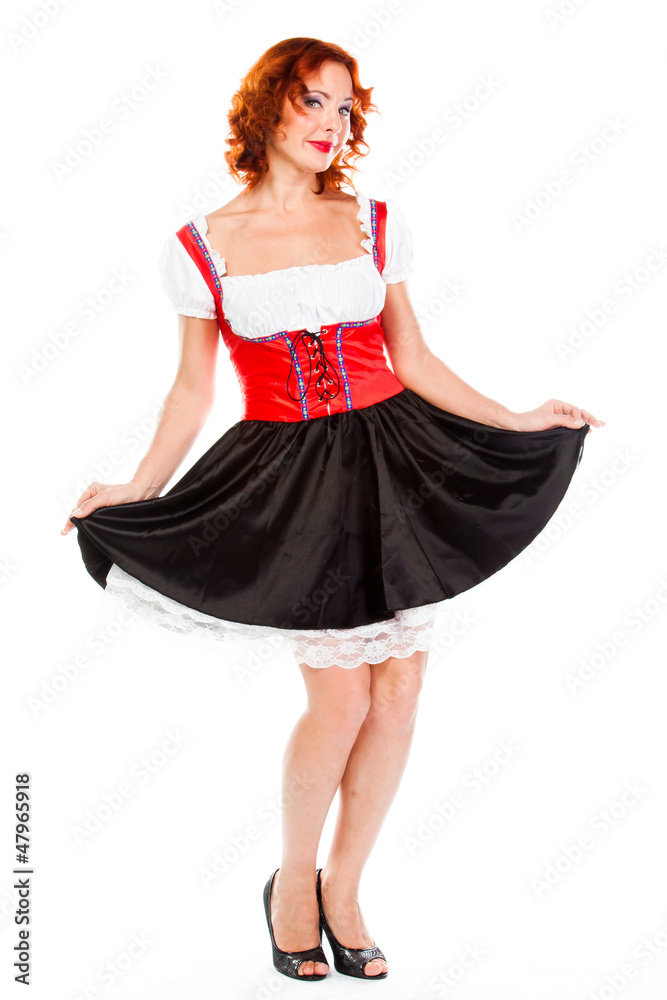 young and beautiful woman in a traditional Bavarian dress young and beautiful woman in a traditional Bavarian dress
