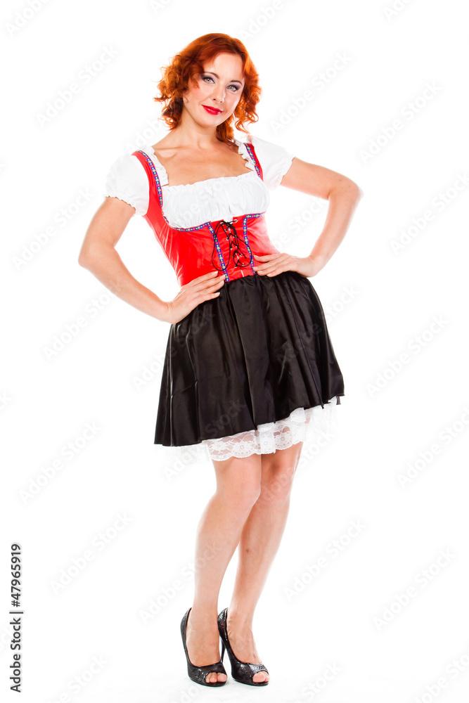 young and beautiful woman in a traditional Bavarian dress