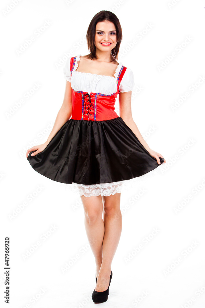young and beautiful woman in a traditional Bavarian dress young and beautiful woman in a traditional Bavarian dress