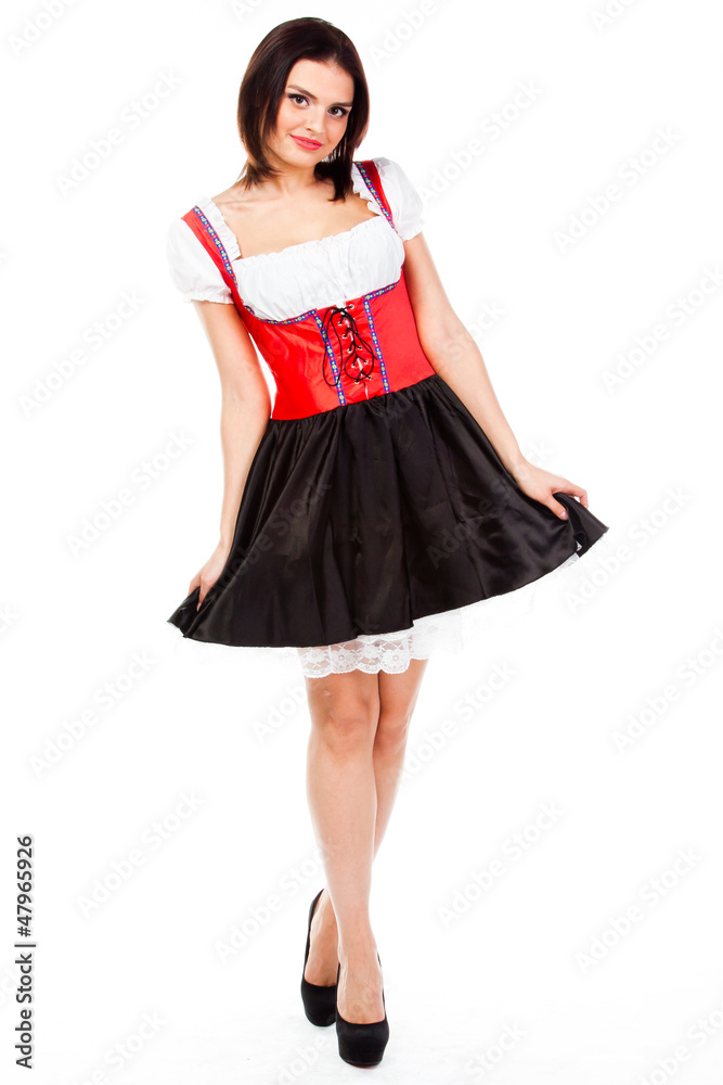 young and beautiful woman in a traditional Bavarian dress young and beautiful woman in a traditional Bavarian dress