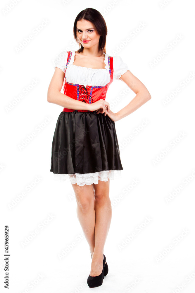 young and beautiful woman in a traditional Bavarian dress young and beautiful woman in a traditional Bavarian dress