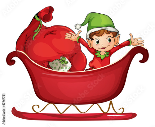 A smiling boy in a sledge