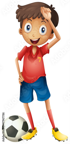 A smiling boy and a football