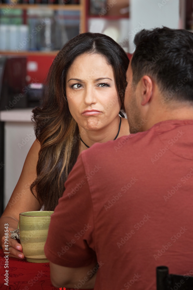Frowning Woman Looking at Man Frowning Woman Looking at Man
