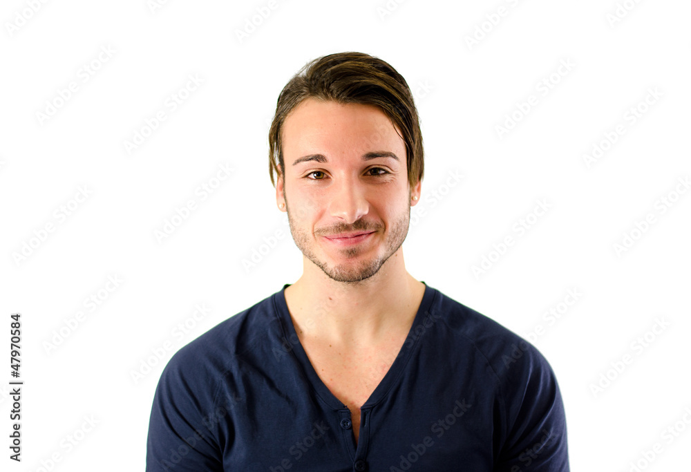 Attractive young man smiling and looking at camera Attractive young man smiling and looking at camera