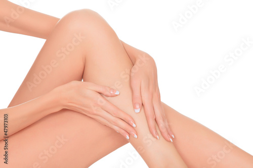 Beautiful woman legs against white background