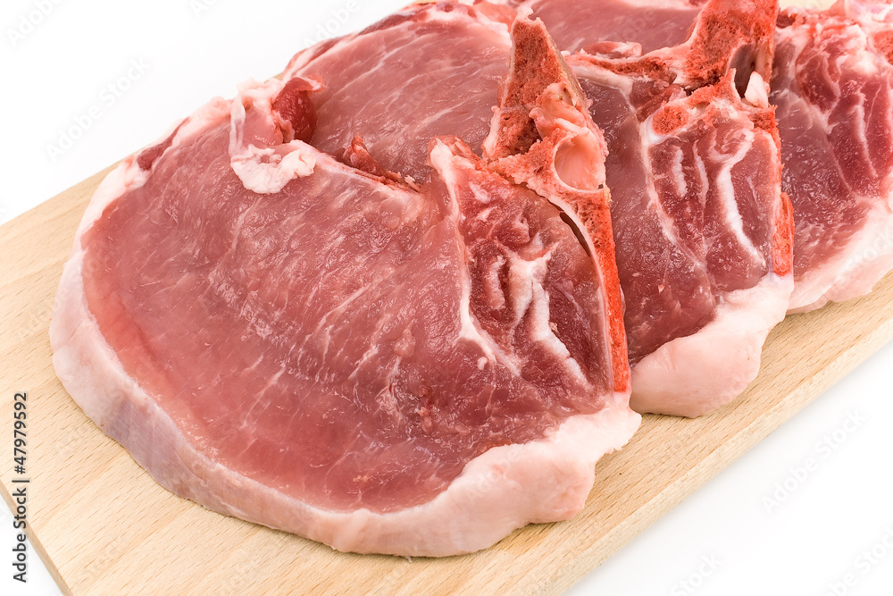 Rib eye steak meat on a cutting board