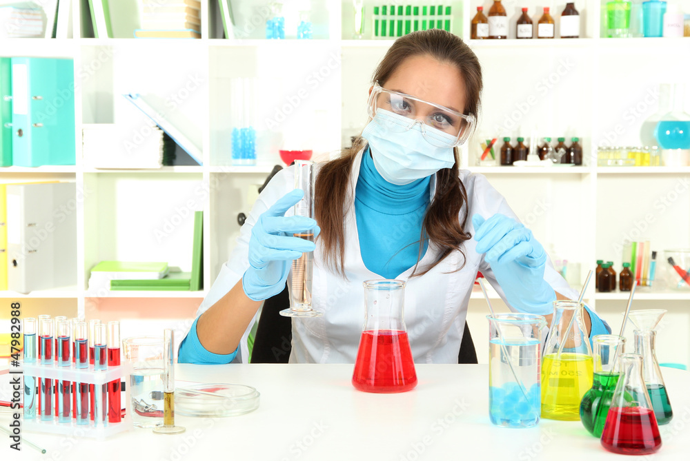 Young scientist in laboratory. Young scientist in laboratory.