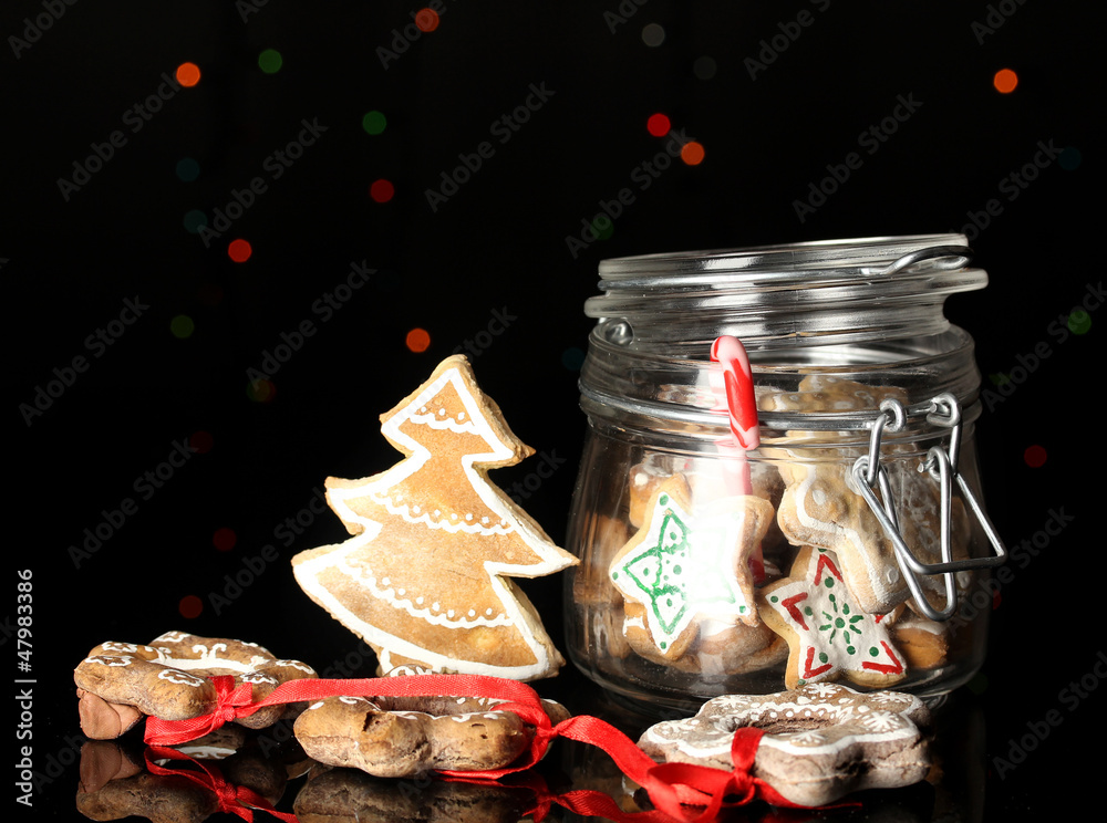 Christmas treats in bank on Christmas lights background