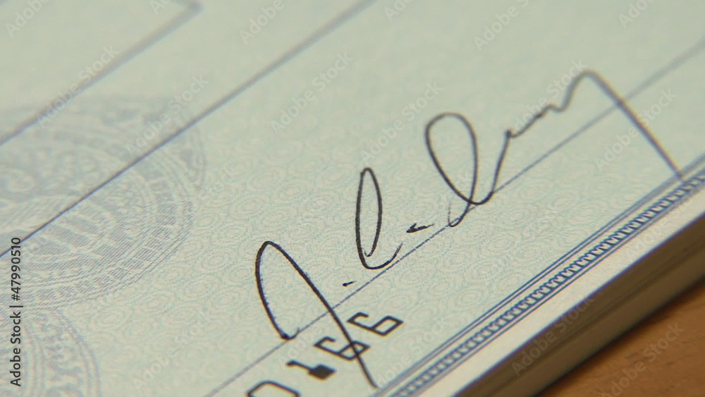 Writing a Bank Check, signing a bank check