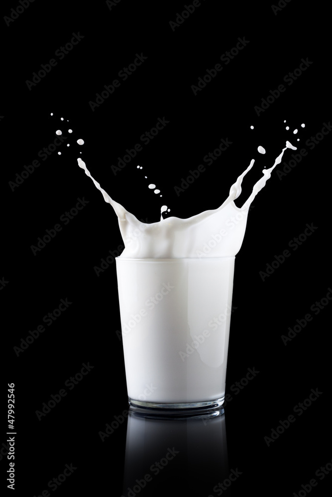 Splash in a glass with milk Splash in a glass with milk