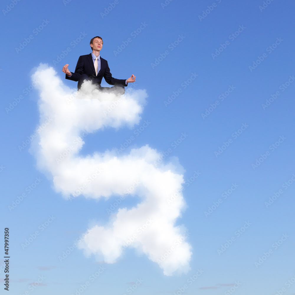 Businessman meditating sitting on the cloud Businessman meditating sitting on the cloud