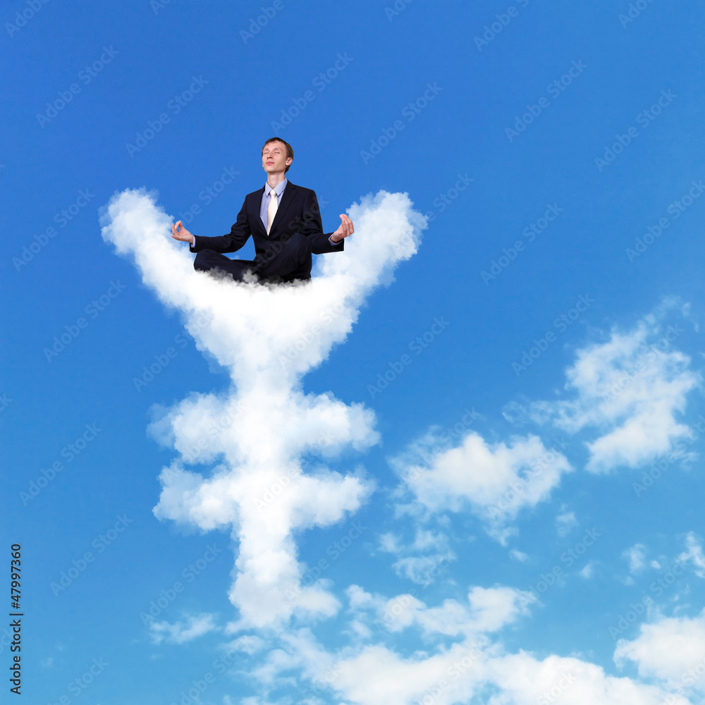 Businessman meditating sitting on the cloud Businessman meditating sitting on the cloud