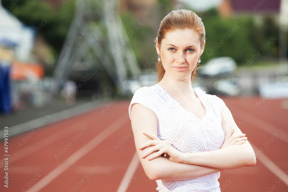 Business woman at athletic stadium Business woman at athletic stadium
