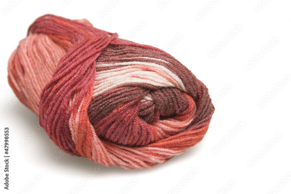 skein of wool in red on a white background
