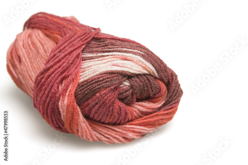 skein of wool in red on a white background