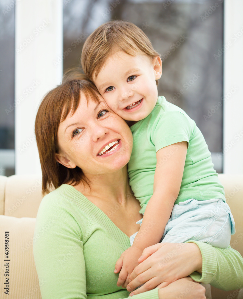 Mother is having fun with her son Mother is having fun with her son