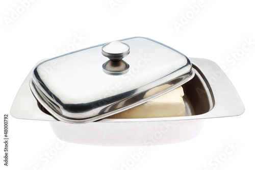 Butterdish close up. On a white background.