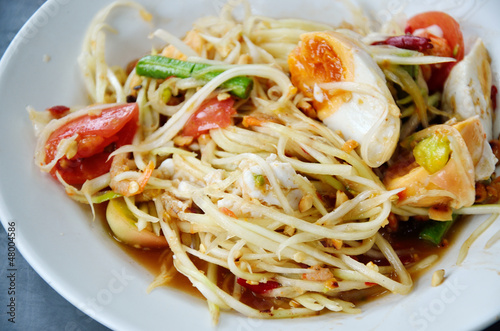 Green papaya salad with salted egg thai cuisine