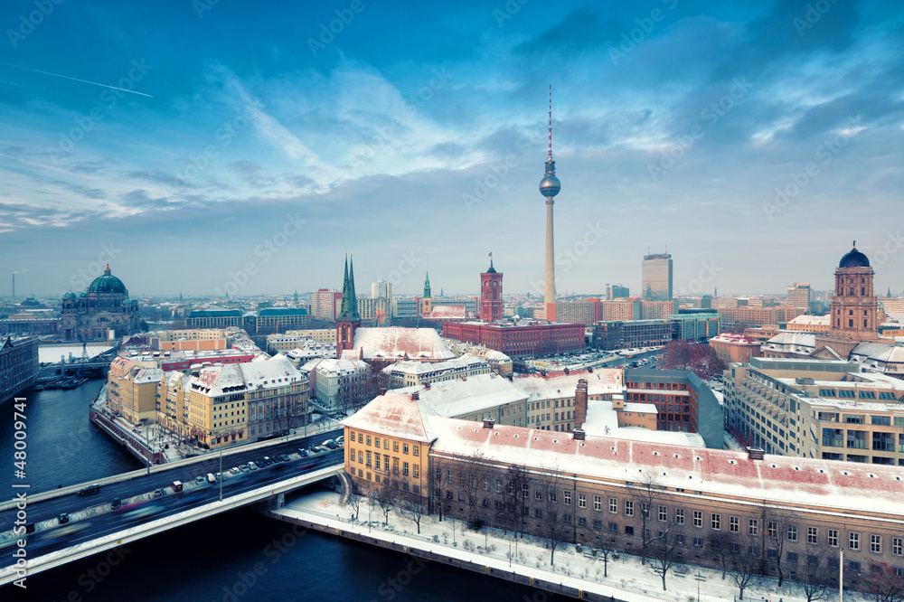 Berlin Skyline Winter City Panorama with snow and blue sky - obrazy, fototapety, plakaty 