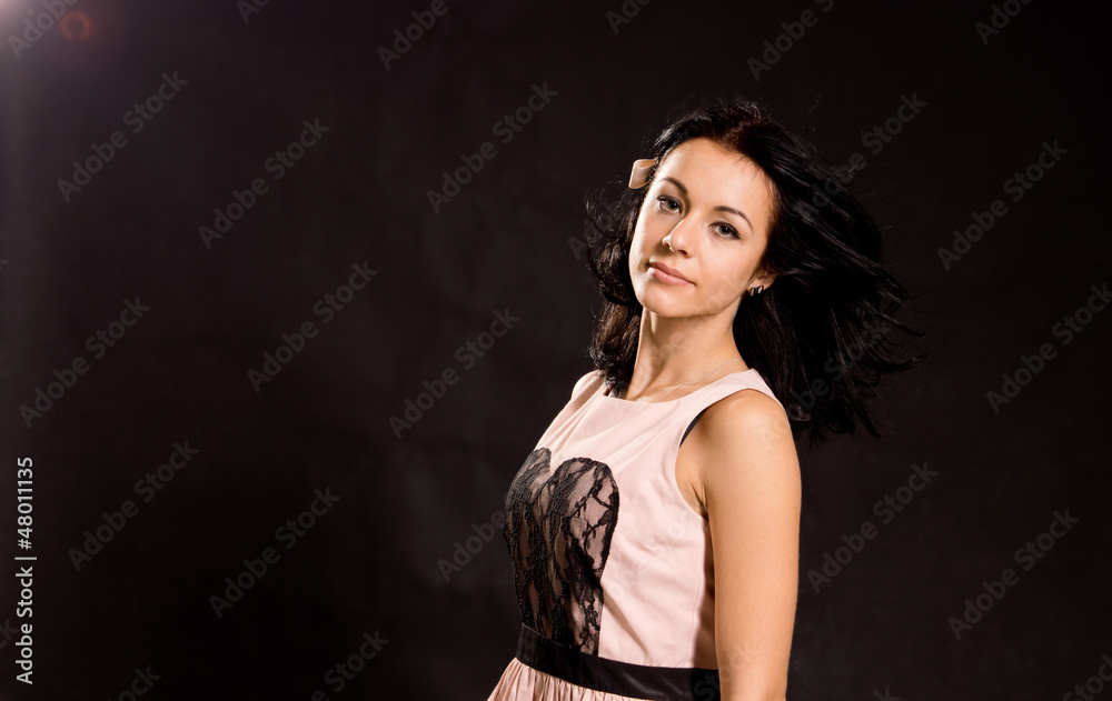 Naklejka premium Beautiful woman in a party dress