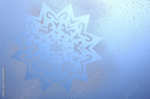 Snowflake pattern on window