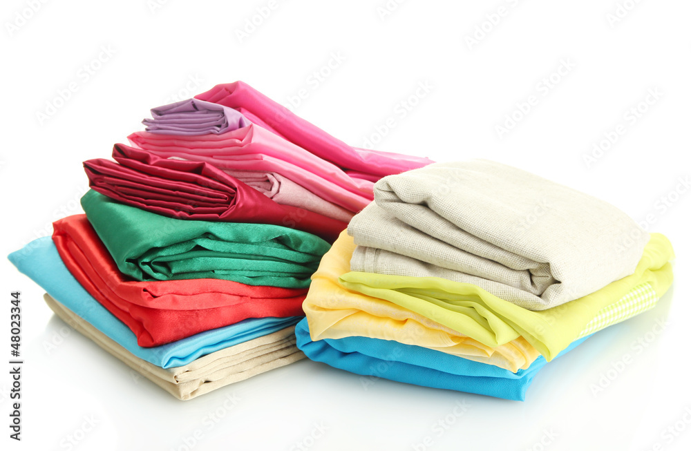 heap of cloth fabrics isolated on white heap of cloth fabrics isolated on white