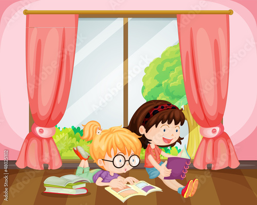Girls reading book
