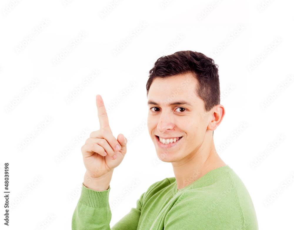 Portrait of happy young casual man pointing over white backgroun Portrait of happy young casual man pointing over white backgroun