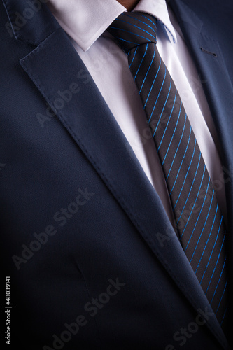 Blue business suit and tie
