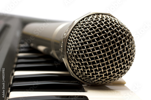 Canvas Print Microphone and electronic keyboard.  Are isolated on a white bac