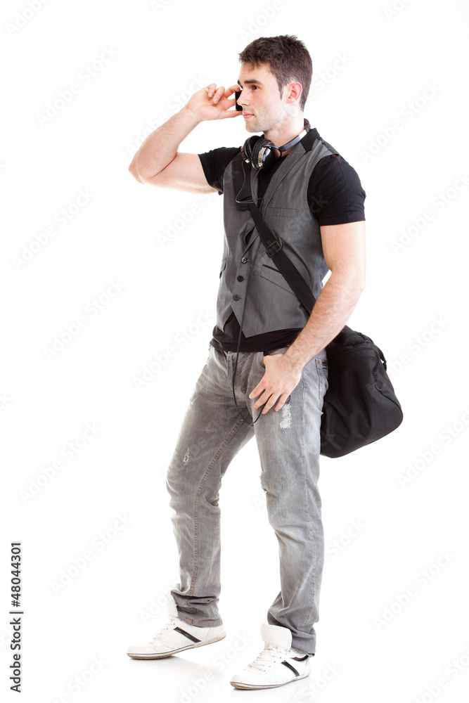 Full length portrait school boy talking phone Full length portrait school boy talking phone