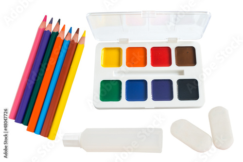 shool accessories, pencil, eraser, glue, paintson on a white bac