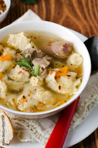 Meat soup with dumplings and spices