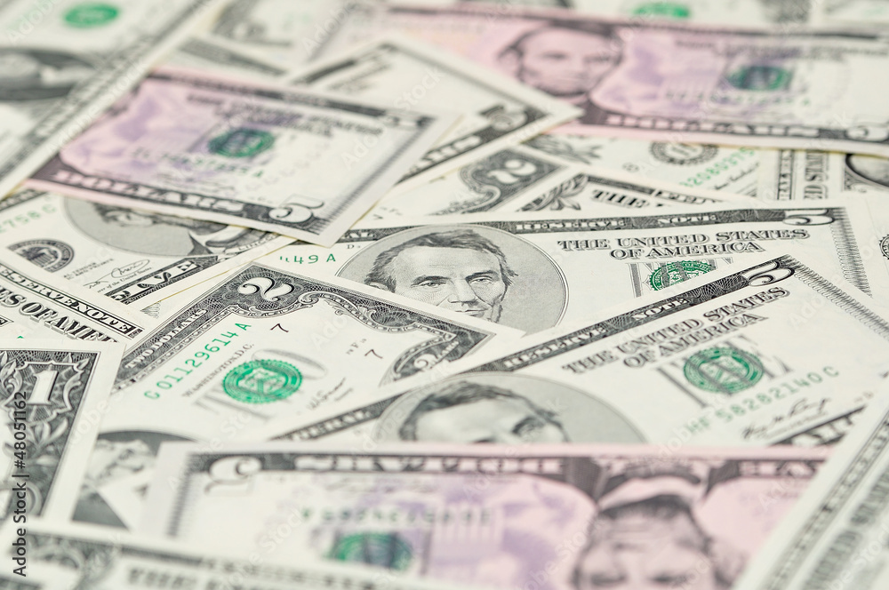 Dollar banknotes as background with selective focus. Dollar banknotes as background with selective focus.