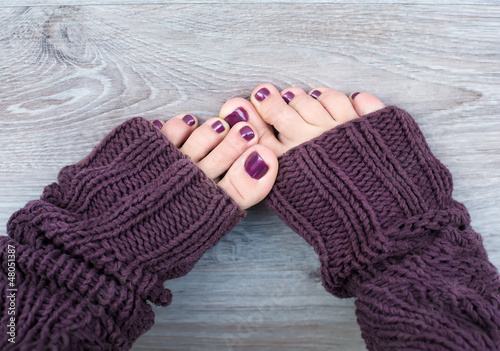 Female feet in brown socks