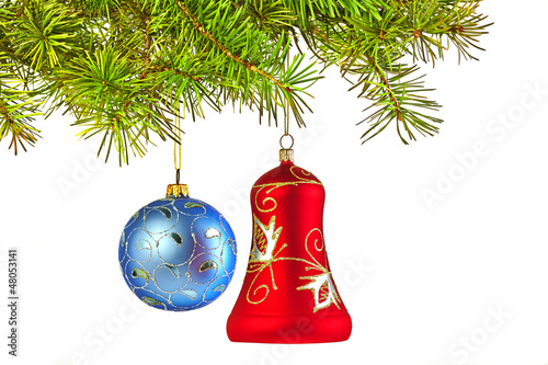 Christmas decoration-glass red bell and blue ball on fir branche