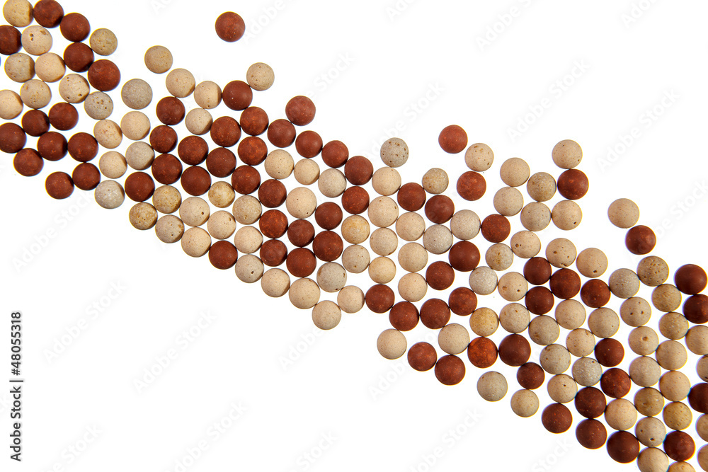 Red and yellow stone balls on white Red and yellow stone balls on white
