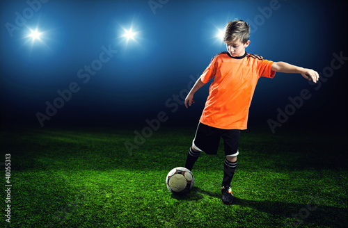 Child plays Soccer