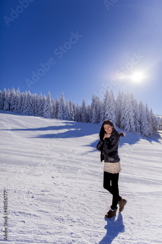 Young woman on winter vacation