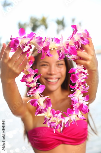 Hawaii woman showing flower lei garland photo