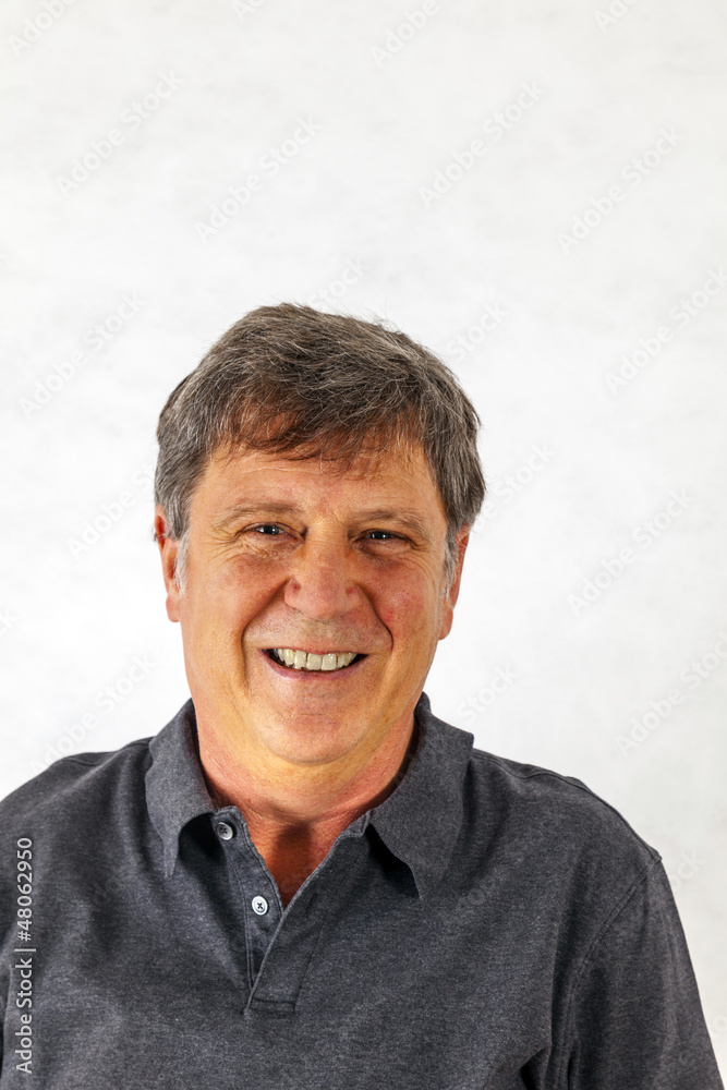 stylish man standing and gesturing with his hands stylish man standing and gesturing with his hands