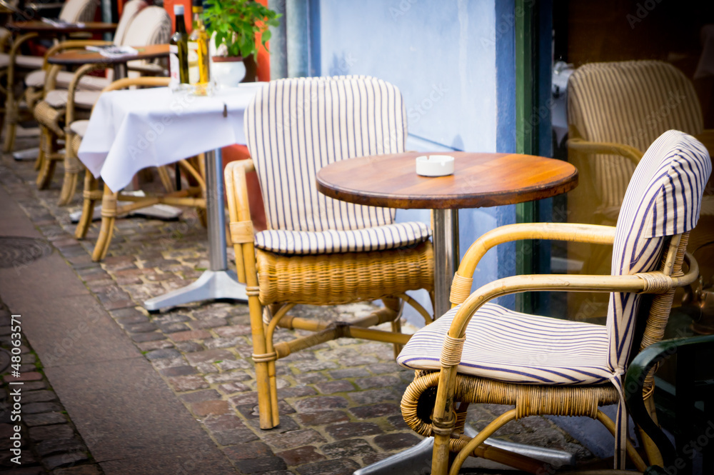 Vintage old fashioned cafe chairs with table in Copenhagen, Denm