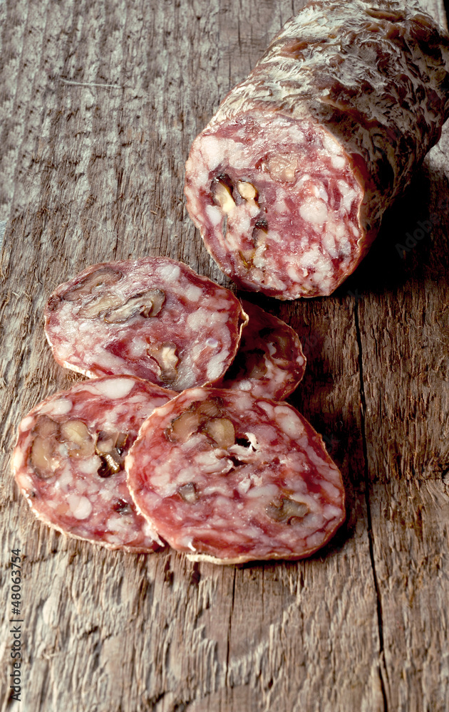 Pork and walnut salami with slices Pork and walnut salami with slices