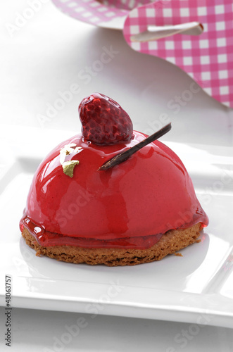 Raspberry mousse dessert with pink checked box
