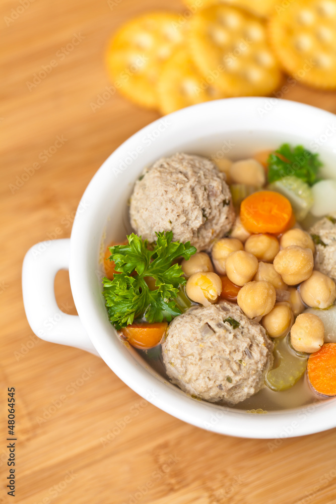 Chicpeas soup with meatballs and vegetables